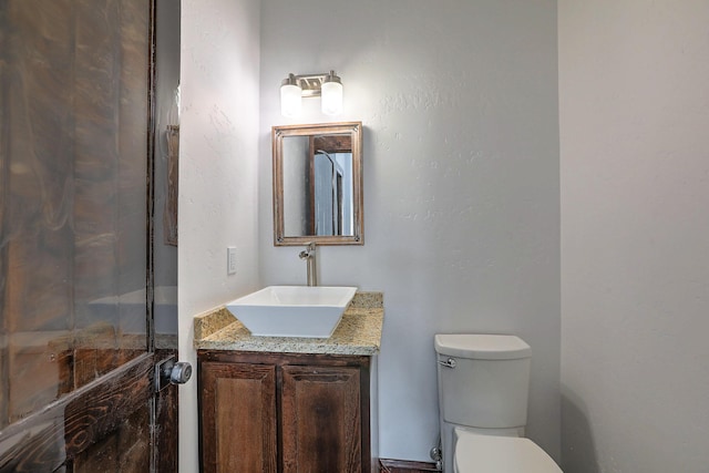 1209 11th St SE, Rio Rancho, NM 87124 - bathroom featuring vanity and toilet