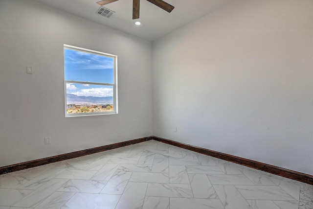 1209 11th St SE, Rio Rancho, NM 87124 - spare room featuring a ceiling fan, baseboards, recessed lighting, and light marble finish floors