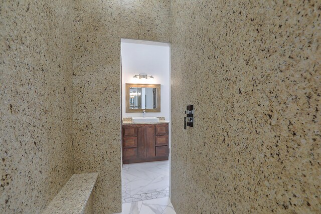 1209 11th St SE, Rio Rancho, NM 87124 - hall featuring a sink and light marble finish floors