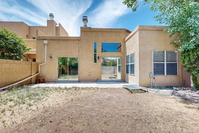 10809 Academy Ridge Rd NE, Albuquerque, NM 87111 - back of property featuring stucco siding