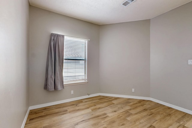 10809 Academy Ridge Rd NE, Albuquerque, NM 87111 - empty room featuring light wood-style floors and baseboards