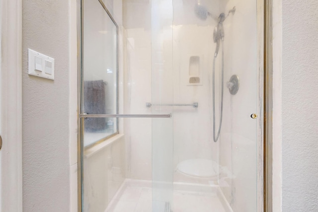 10809 Academy Ridge Rd NE, Albuquerque, NM 87111 - full bath featuring a textured wall and a stall shower