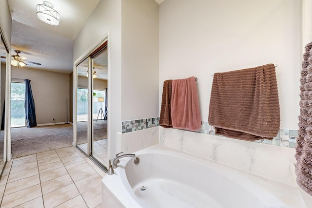 10809 Academy Ridge Rd NE, Albuquerque, NM 87111 - full bath with a bath, ceiling fan, and tile patterned floors