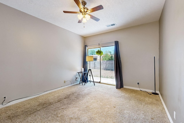 10809 Academy Ridge Rd NE, Albuquerque, NM 87111 - carpeted empty room with a ceiling fan, a textured ceiling, and baseboards
