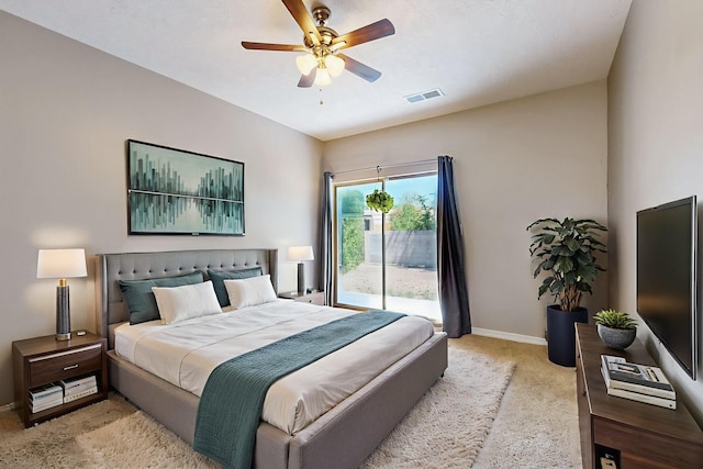 10809 Academy Ridge Rd NE, Albuquerque, NM 87111 - bedroom featuring access to outside, light carpet, baseboards, and a ceiling fan