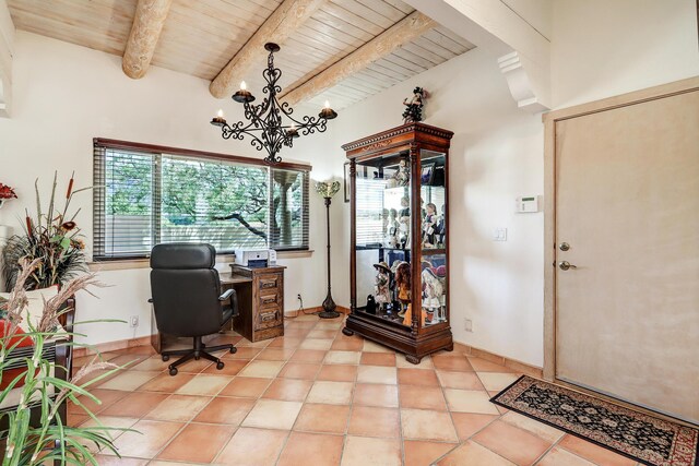 44 Roadrunner Trl, Placitas, NM 87043 - office area with wooden ceiling with exposed beams, a chandelier, light tile patterned floors, and baseboards