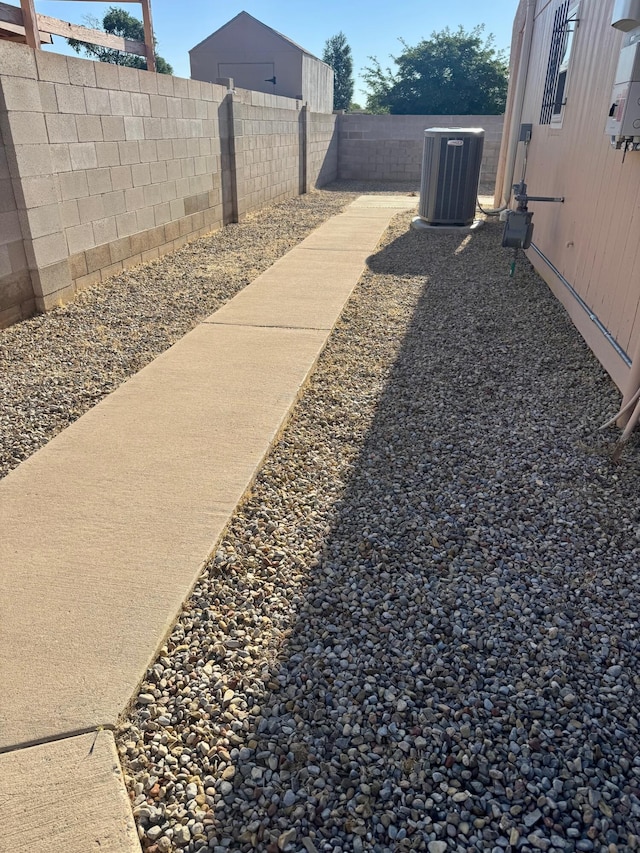 774 Stallion Rd SE, Rio Rancho, NM 87124 - fenced backyard with cooling unit