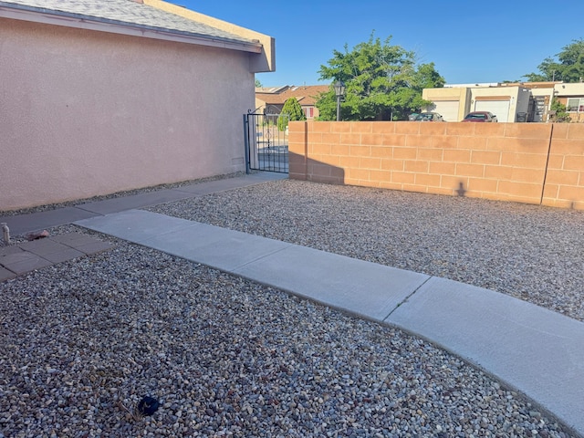 774 Stallion Rd SE, Rio Rancho, NM 87124 - view of yard with a gate