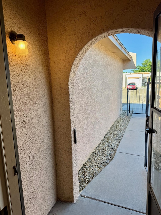 774 Stallion Rd SE, Rio Rancho, NM 87124 - property entrance with stucco siding