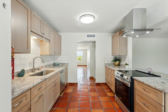 4508 Shiloh Pl NE, Albuquerque, NM 87111 - kitchen with freestanding refrigerator, tasteful backsplash, tile patterned flooring, light stone countertops, and a textured ceiling