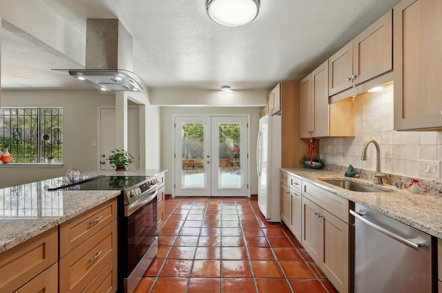 4508 Shiloh Pl NE, Albuquerque, NM 87111 - kitchen featuring stainless steel appliances, exhaust hood, french doors, tile patterned flooring, and a textured ceiling