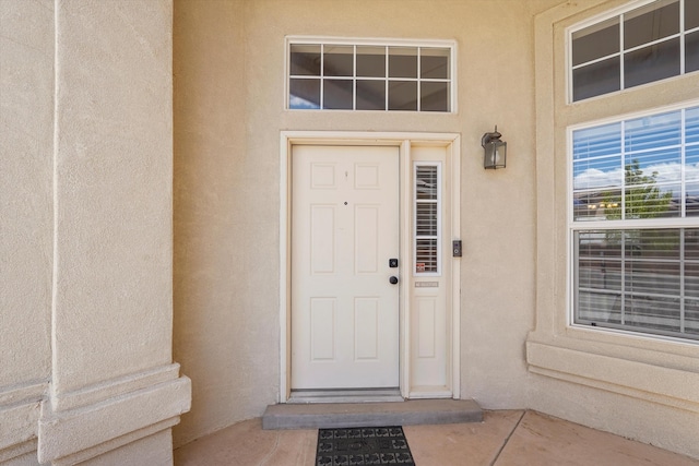 1311 Mirador Loop NE, Rio Rancho, NM 87144 - view of exterior entry with stucco siding