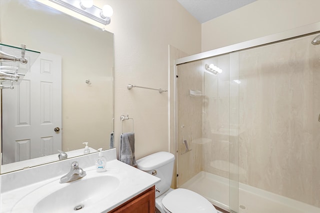 1311 Mirador Loop NE, Rio Rancho, NM 87144 - full bathroom featuring toilet, a stall shower, and vanity