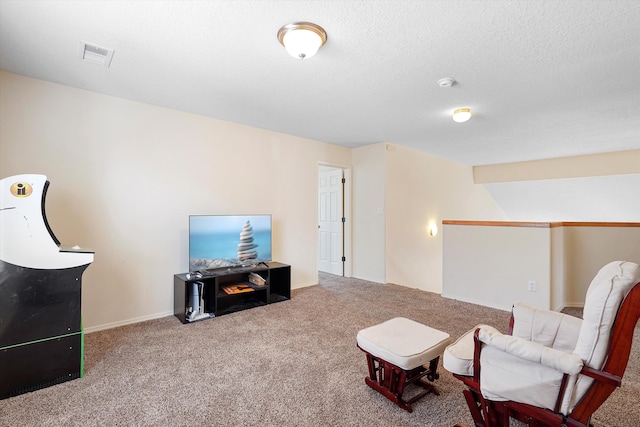 1311 Mirador Loop NE, Rio Rancho, NM 87144 - carpeted living area with baseboards and a textured ceiling