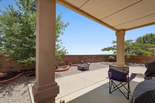 1311 Mirador Loop NE, Rio Rancho, NM 87144 - fenced backyard featuring a patio