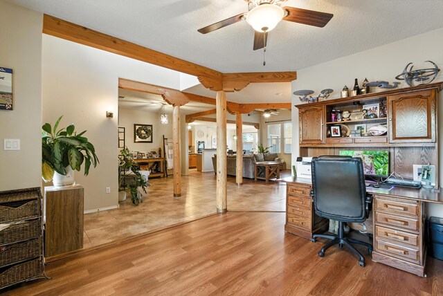 2004 Rancho Oro Ave SE, Rio Rancho, NM 87124 - home office featuring ceiling fan and light wood finished floors