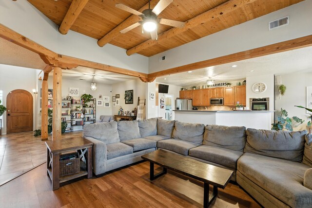2004 Rancho Oro Ave SE, Rio Rancho, NM 87124 - living room with a ceiling fan, a wood ceiling with exposed beams, and light wood finished floors