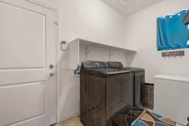 240 Rio Chama Cir SW, Los Lunas, NM 87031 - washroom with independent washer and dryer and light tile patterned flooring