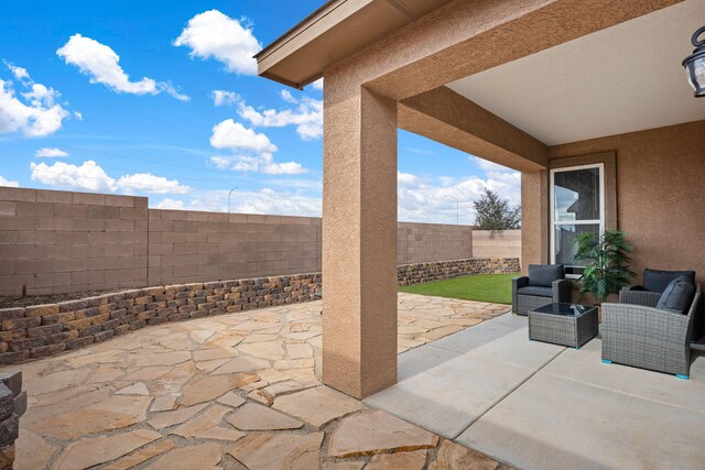 240 Rio Chama Cir SW, Los Lunas, NM 87031 - fenced backyard featuring a patio