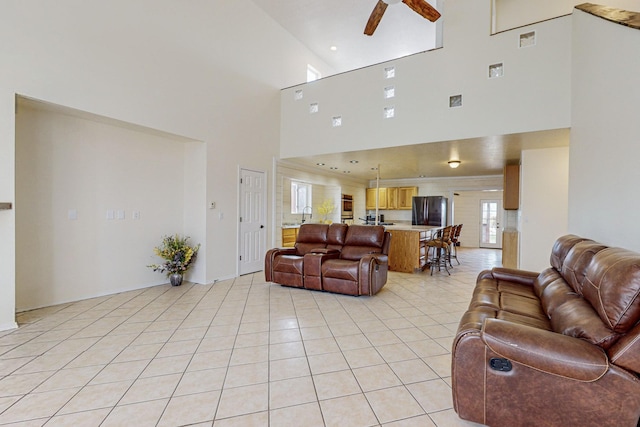 41 El Rancho Grande Rd, Mcintosh, NM 87032 - living area featuring a high ceiling, a ceiling fan, and light tile patterned floors