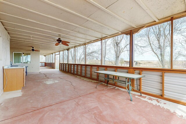 41 El Rancho Grande Rd, Mcintosh, NM 87032 - unfurnished sunroom featuring a ceiling fan