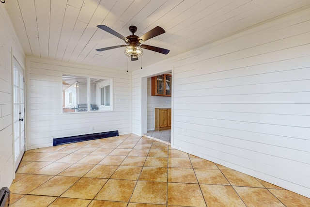 41 El Rancho Grande Rd, Mcintosh, NM 87032 - unfurnished sunroom with baseboard heating and a baseboard heating unit