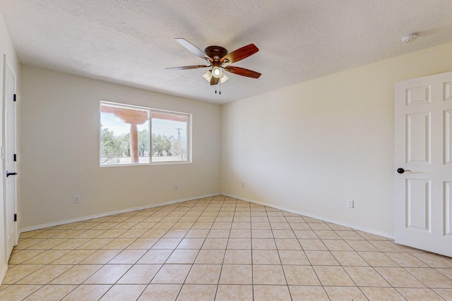 41 El Rancho Grande Rd, Mcintosh, NM 87032 - unfurnished room featuring a ceiling fan, a smoke detector, a textured ceiling, and light tile patterned floors