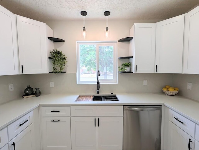 2824 Texas St NE, Albuquerque, NM 87110 - kitchen featuring open shelves, stainless steel dishwasher, a sink, white cabinetry, and a textured ceiling