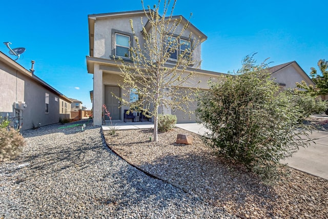 4871 Longs Peak Rd NE, Rio Rancho, NM 87144 - rear view of property featuring stucco siding