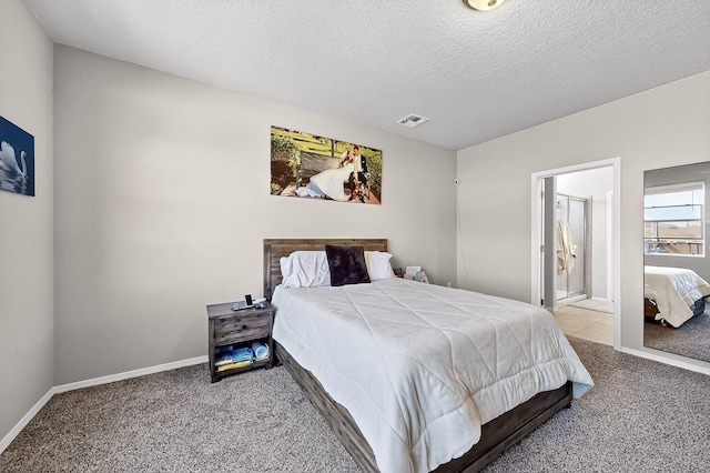 4871 Longs Peak Rd NE, Rio Rancho, NM 87144 - carpeted bedroom featuring a textured ceiling, baseboards, and ensuite bathroom