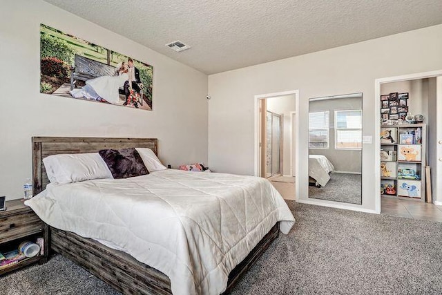 4871 Longs Peak Rd NE, Rio Rancho, NM 87144 - carpeted bedroom with a textured ceiling