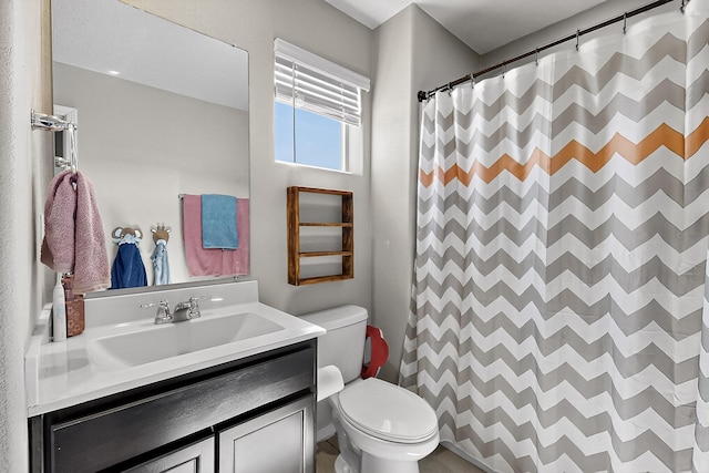 4871 Longs Peak Rd NE, Rio Rancho, NM 87144 - full bathroom with toilet, vanity, and curtained shower