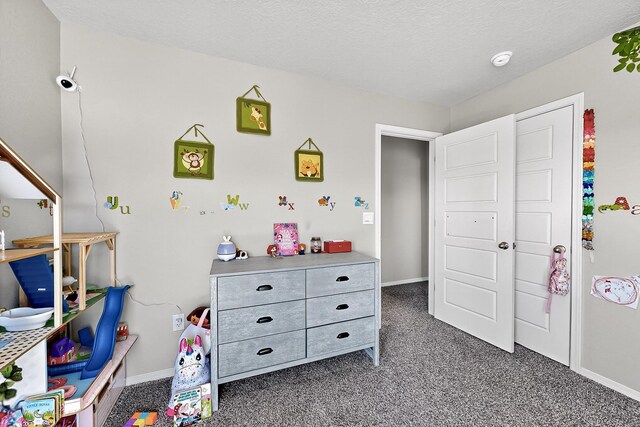 4871 Longs Peak Rd NE, Rio Rancho, NM 87144 - carpeted bedroom with baseboards and a textured ceiling