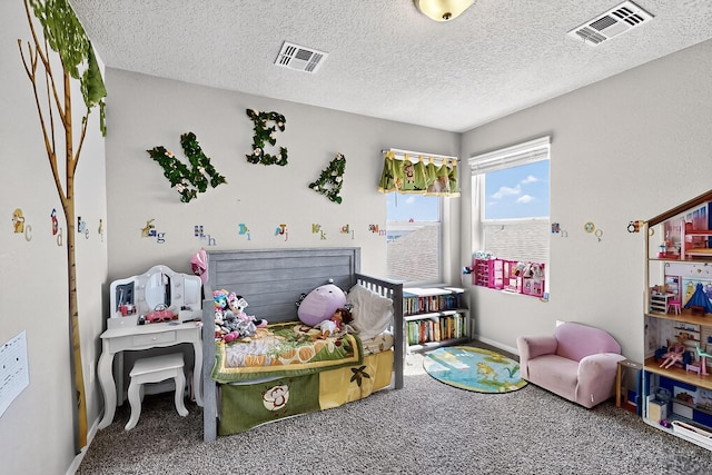 4871 Longs Peak Rd NE, Rio Rancho, NM 87144 - carpeted bedroom featuring a textured ceiling