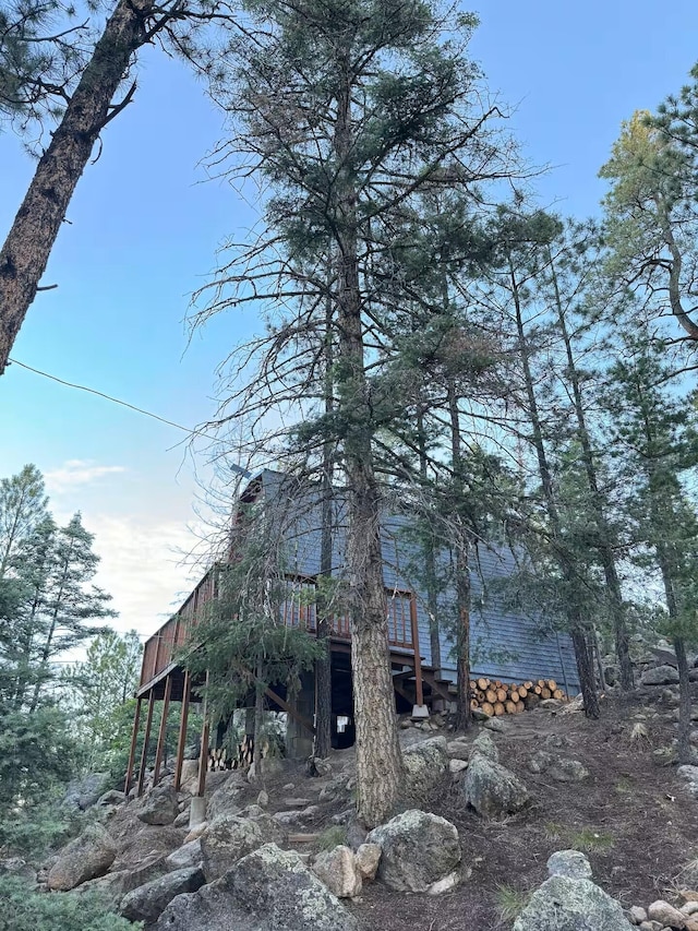 123 Pine Dr, Jemez Springs, NM 87025 - view of side of home featuring a deck