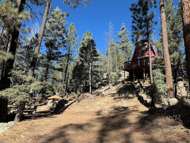 123 Pine Dr, Jemez Springs, NM 87025 - view of yard featuring a wooden deck