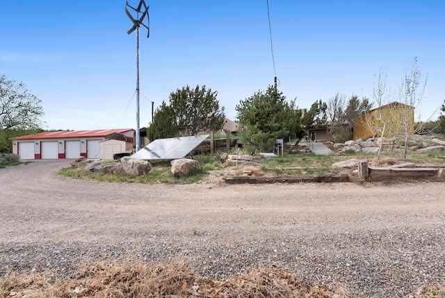 98 Edgewood Unit 7, Edgewood, NM 87015 - view of front of home with a garage