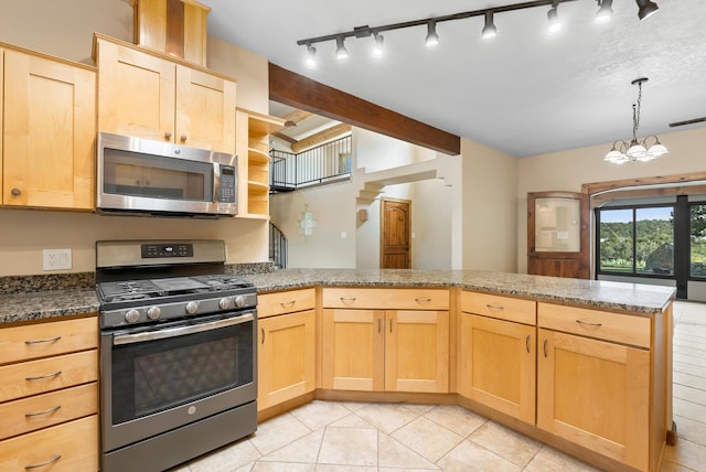98 Edgewood Unit 7, Edgewood, NM 87015 - kitchen with stainless steel appliances, light brown cabinetry, a peninsula, light tile patterned floors, and a chandelier