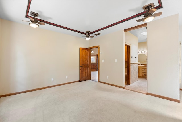 98 Edgewood Unit 7, Edgewood, NM 87015 - unfurnished bedroom featuring light colored carpet, ensuite bathroom, and a ceiling fan