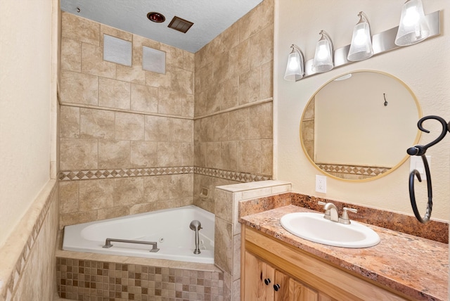 98 Edgewood Unit 7, Edgewood, NM 87015 - bathroom with a whirlpool tub and vanity