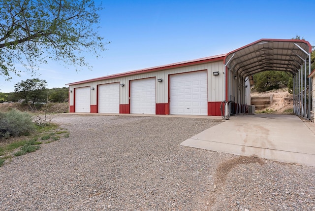 98 Edgewood Unit 7, Edgewood, NM 87015 - garage featuring a garage and driveway