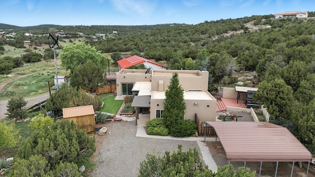 98 Edgewood Unit 7, Edgewood, NM 87015 - aerial view of property and surrounding area featuring a heavily wooded area
