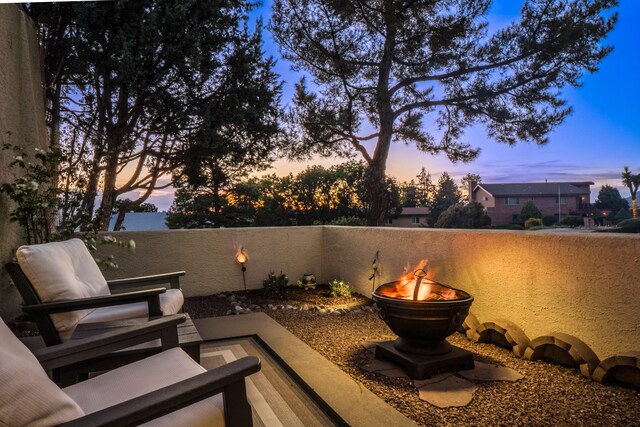 4706 Glenwood Hills Dr NE, Albuquerque, NM 87111 - view of patio / terrace featuring a fire pit