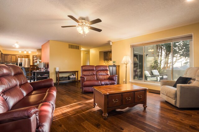 4706 Glenwood Hills Dr NE, Albuquerque, NM 87111 - office space featuring a ceiling fan, dark wood-style flooring, ornamental molding, and a fireplace
