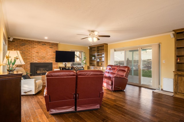 4706 Glenwood Hills Dr NE, Albuquerque, NM 87111 - living room featuring a ceiling fan, wood-type flooring, a fireplace, and ornamental molding