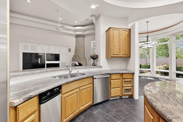 2600 Griegos Pl NW, Albuquerque, NM 87107 - kitchen featuring stainless steel dishwasher, a sink, ceiling fan, light stone counters, and recessed lighting