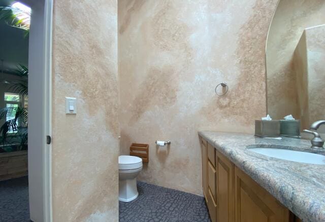 2600 Griegos Pl NW, Albuquerque, NM 87107 - bathroom with vanity and toilet