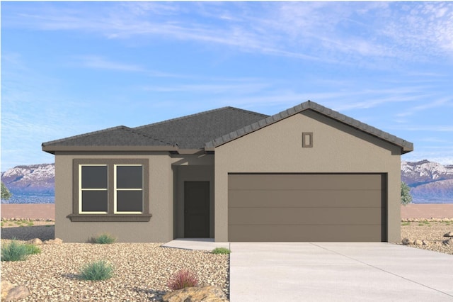1660 Maggie Dr, Rio Rancho, NM 87144 - ranch-style house featuring a mountain view, an attached garage, stucco siding, and driveway