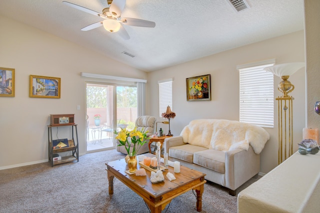 7217 Skagway Dr NE, Rio Rancho, NM 87144 - carpeted living room featuring ceiling fan, lofted ceiling, a textured ceiling, and baseboards