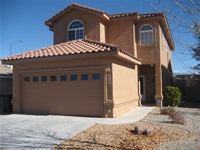 4608 Stafford Pl NW, Albuquerque, NM 87120 - mediterranean / spanish-style home with a tile roof, driveway, stucco siding, and an attached garage